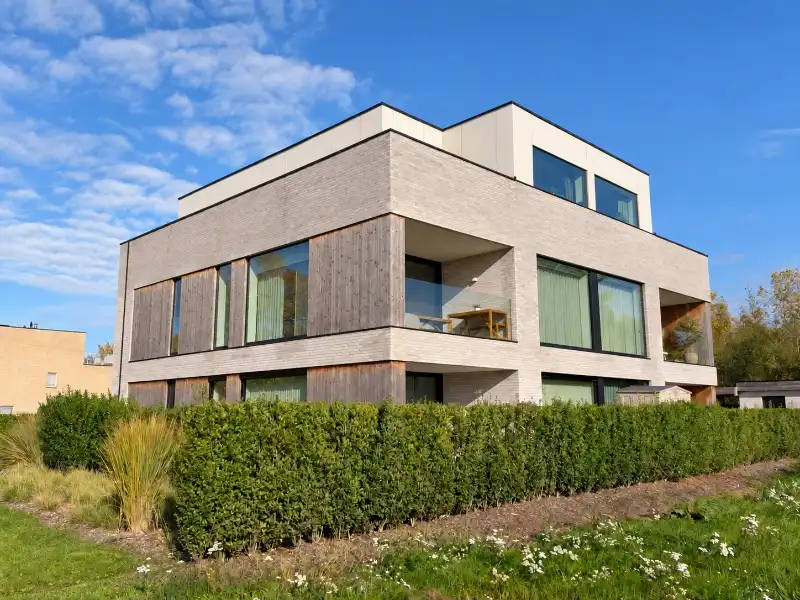 Luxueus designappartement met zuidterras, carport en ruime kelder foto {{pictureIndex}}