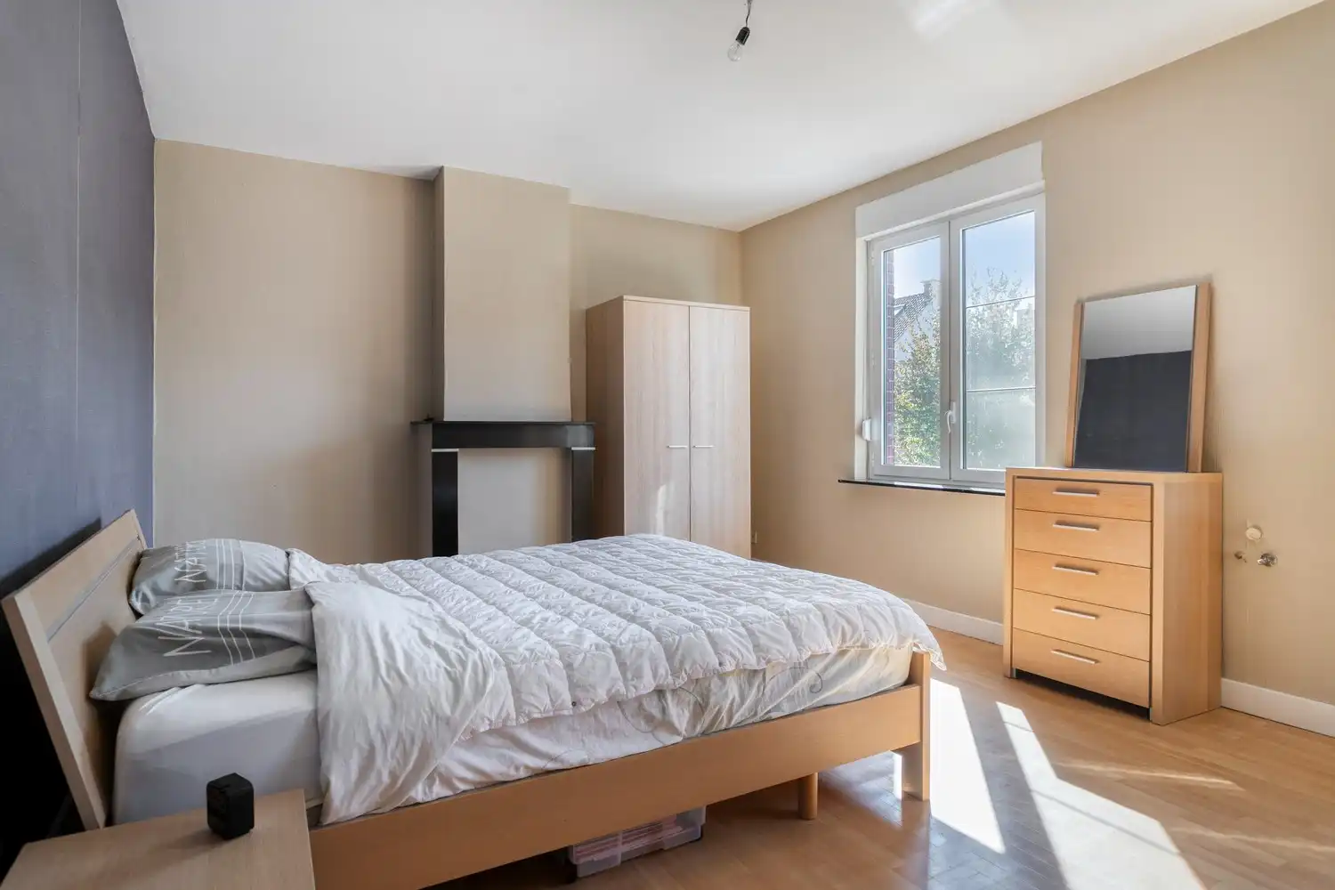 Karaktervolle stadswoning met renovatiepotentieel en unieke troef foto 9