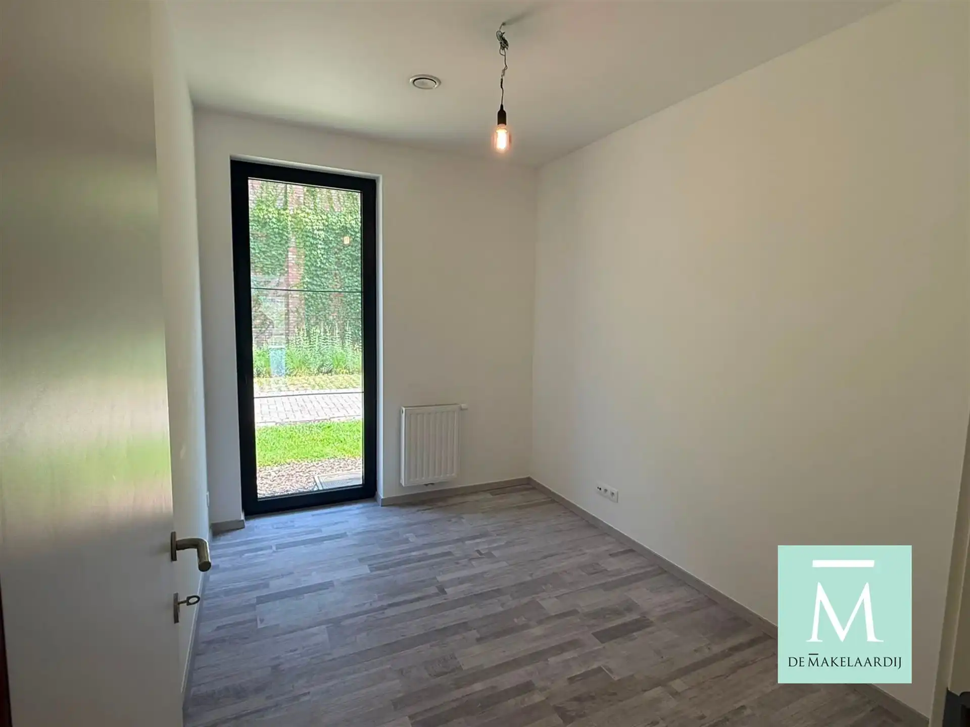 Nieuwbouwappartement met 2 slaapkamers en tuin! foto 3