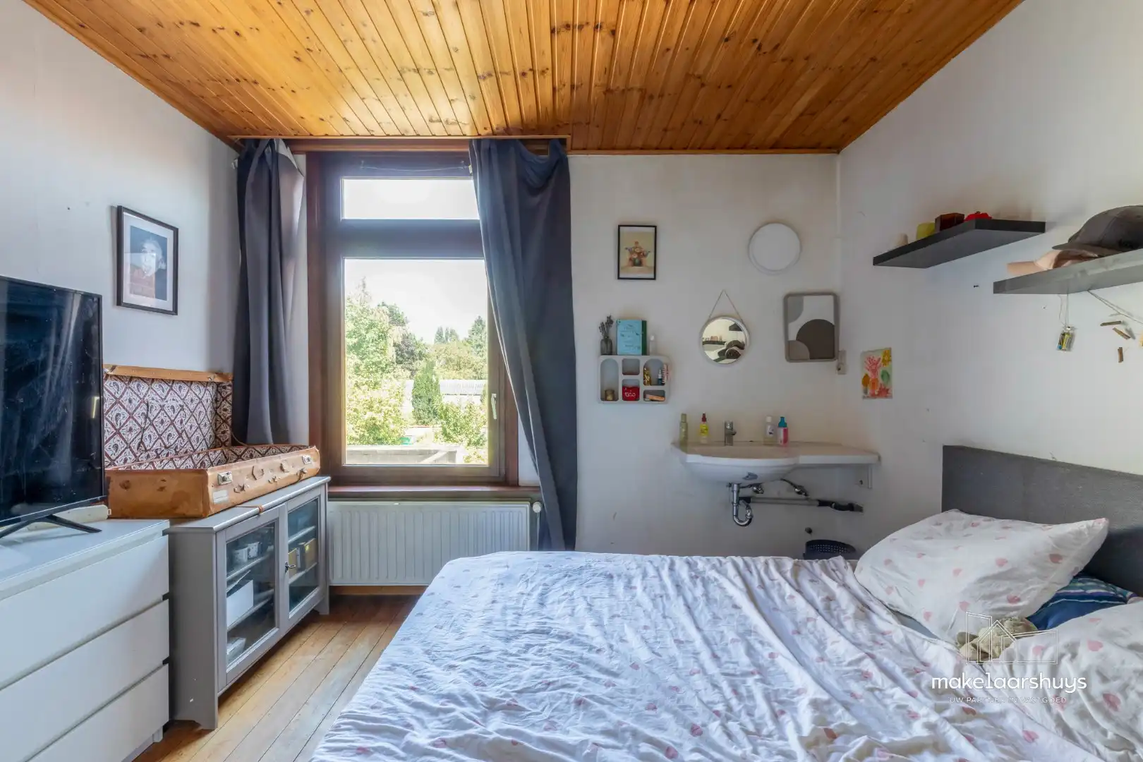 Ruime woning met 4 slpk en aangename tuin te Sint-Amandsberg foto 11