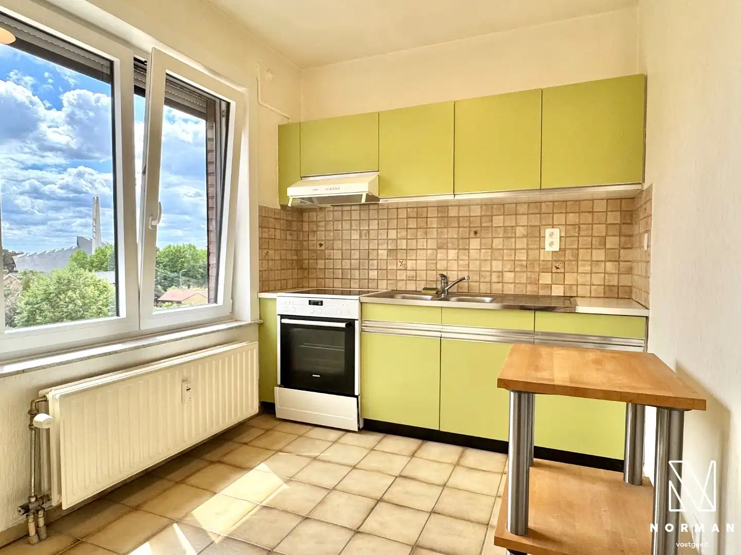 Instapklaar 2-slaapkamer appartement inclusief autostaanplaats en terras te koop in Kuurne! foto 5