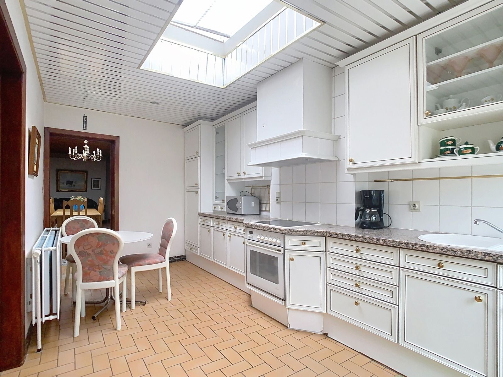 Centraal gelegen rijwoning met 2 SLPK én mooie stadstuin! foto 8