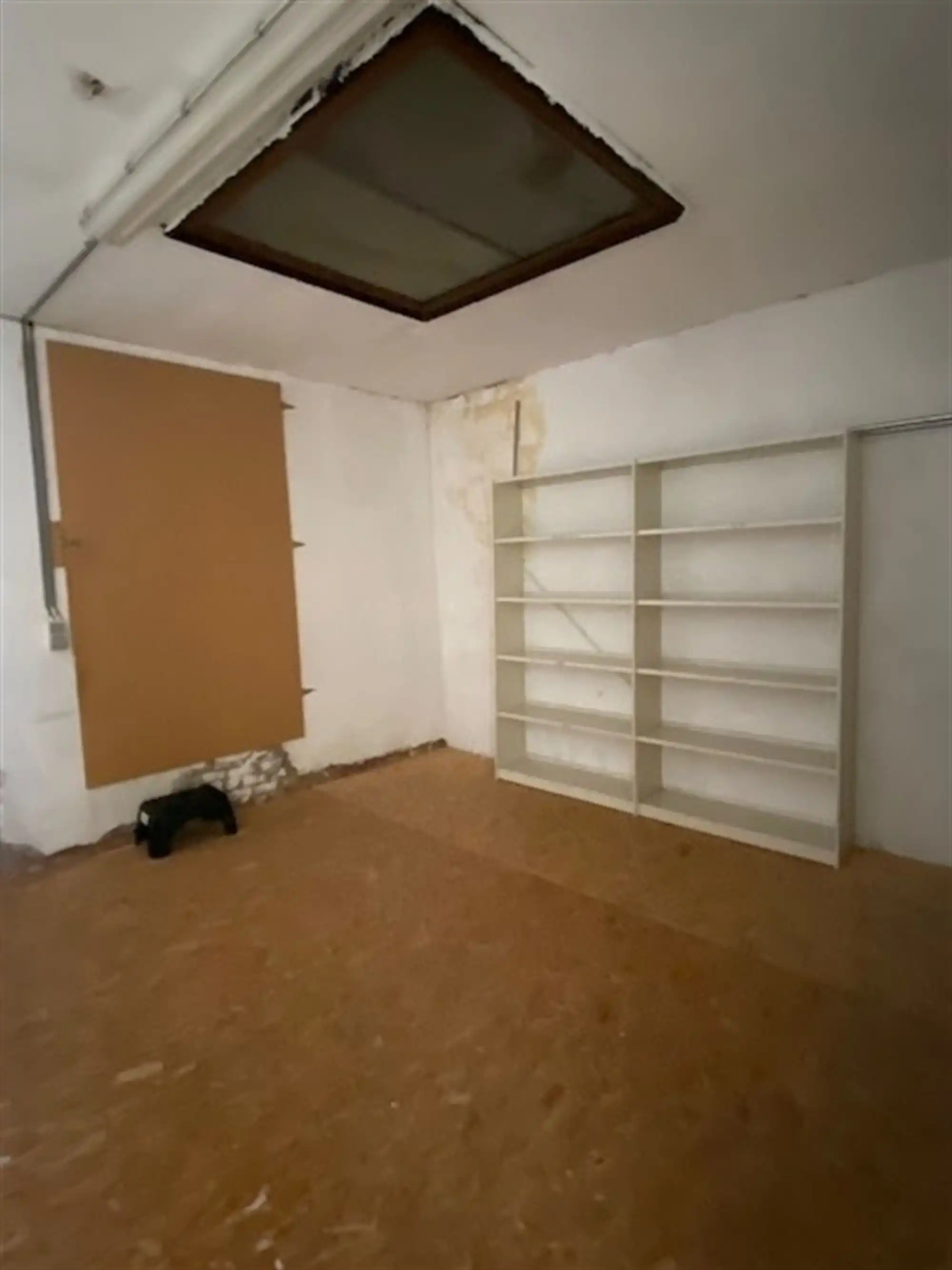 Karaktervol handelshuis met woonst foto 11