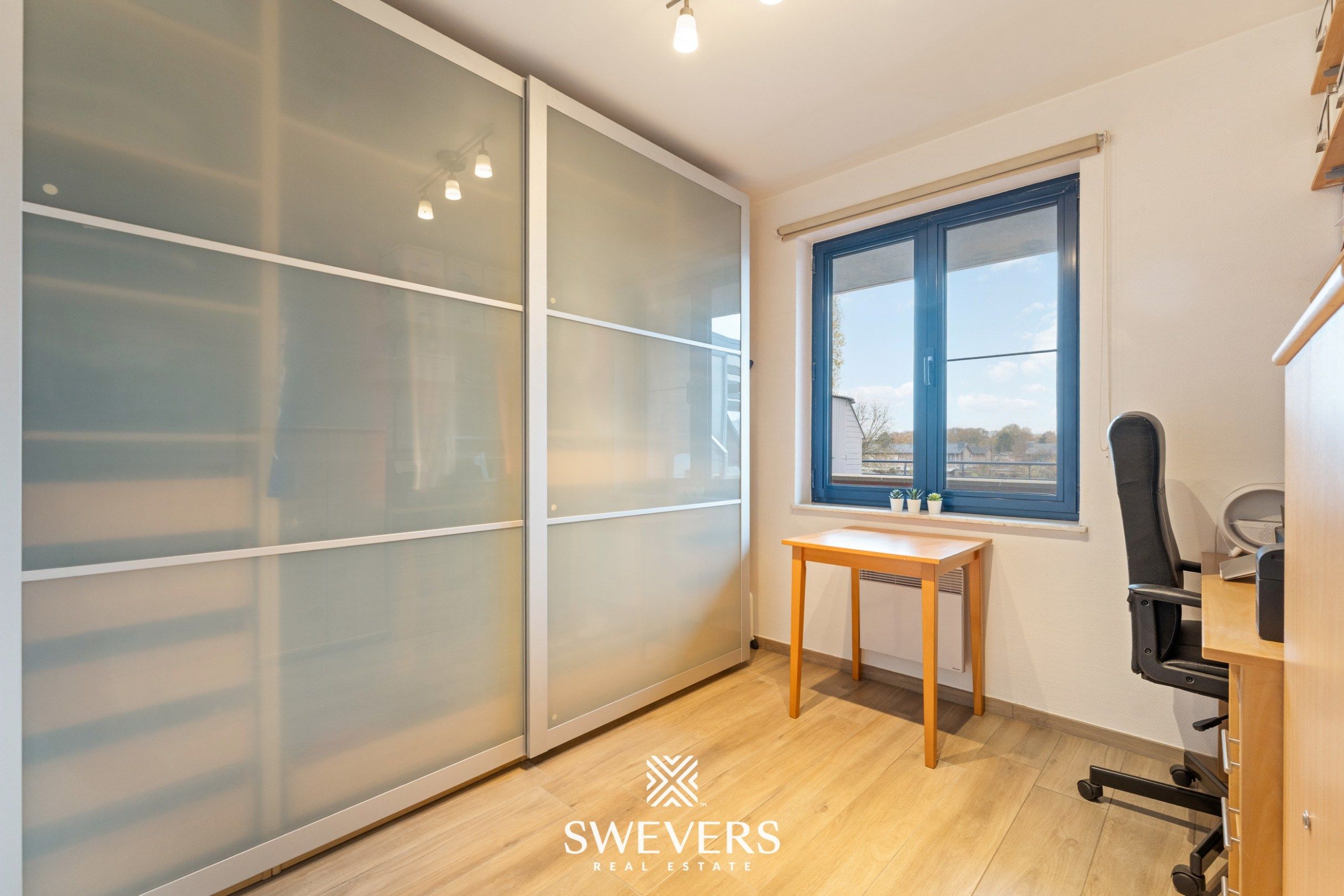 Modern en instapklaar appartement met twee terrassen in hartje Zolder foto 17