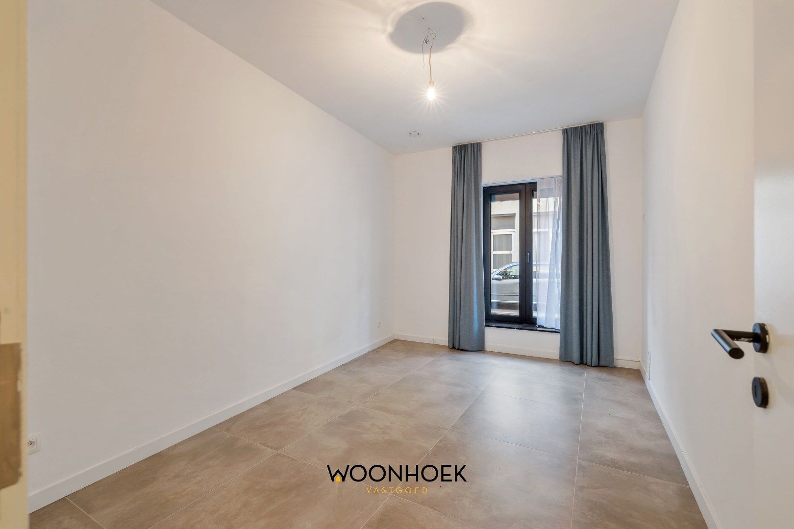 Nieuwbouw gelijkvloersappartement met tuin in centrum Lokeren foto 14