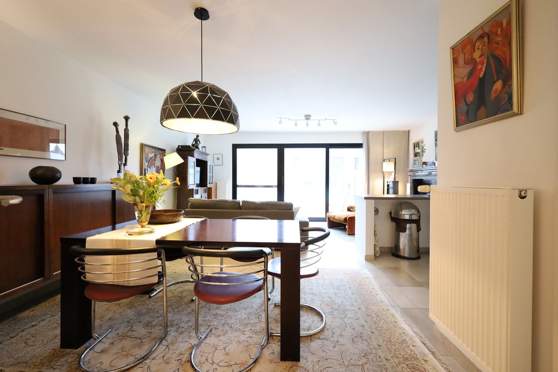 Gelijkvloers appartement met tuin, binnenautostaanplaats en kelder foto 4