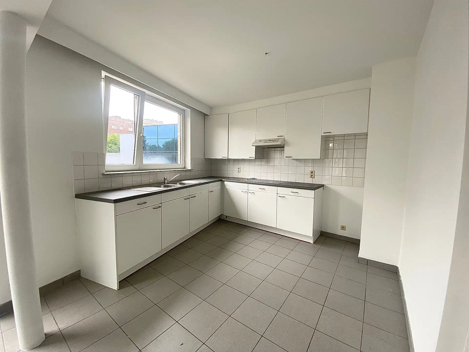 Opbrengsteneigendom bestaande uit 6 appartementen, dubbele garagebox en 6 staanplaatsen te Aalst foto 4