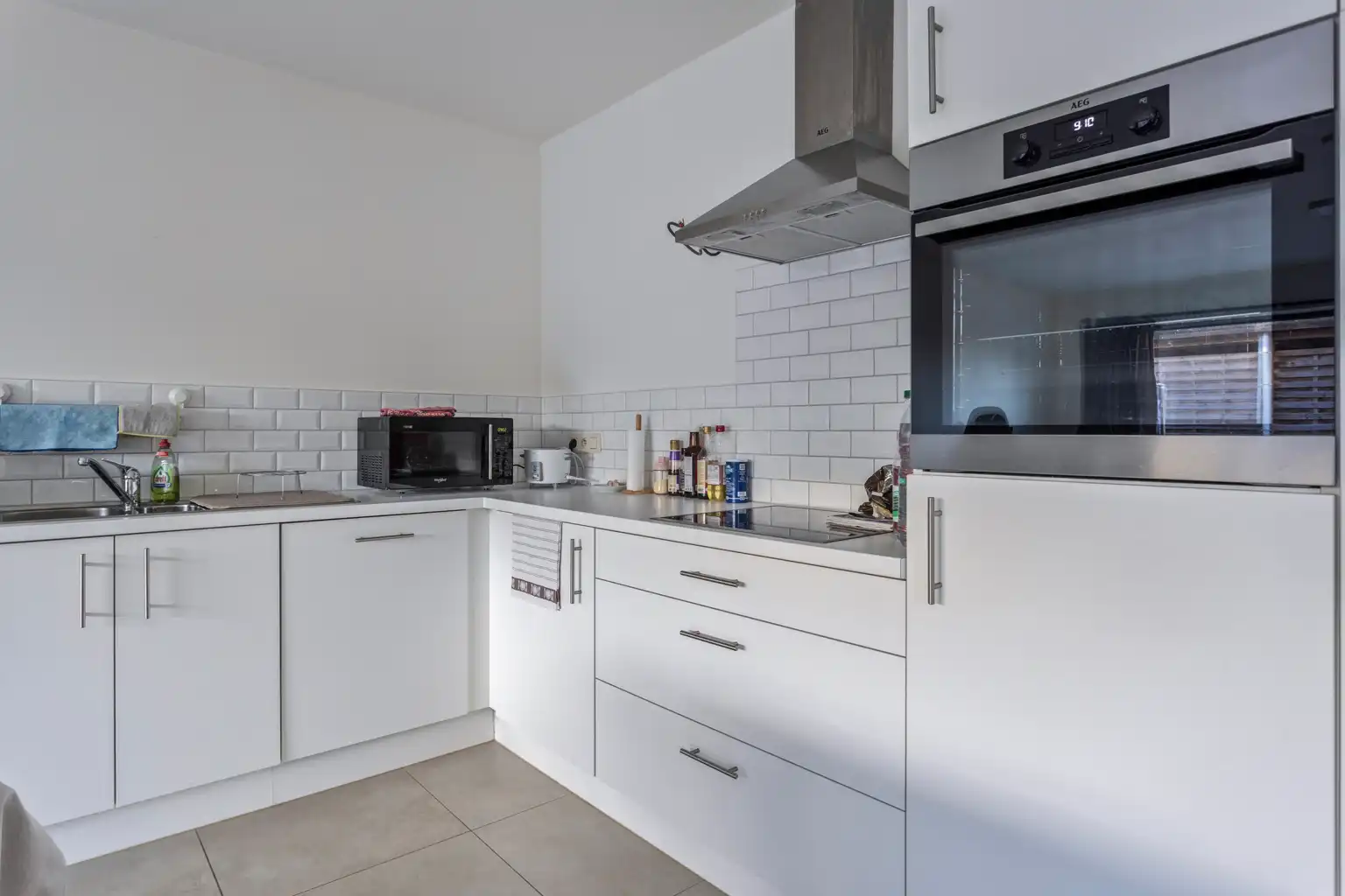 Gelijkvloersapp. in uitstekende staat met 1 slpk en carport foto 6