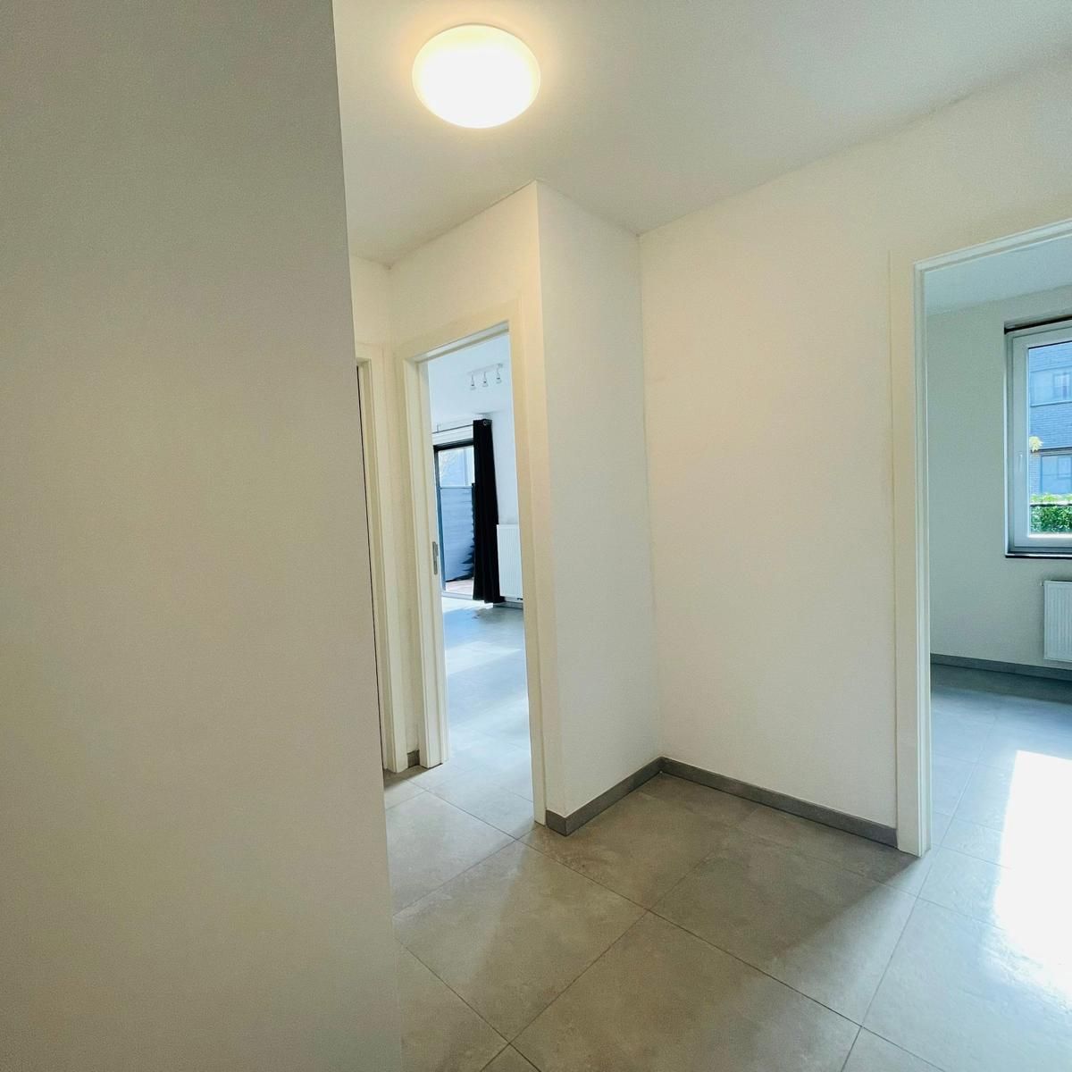 Gelijkvloers 2 slpk-appartement met tuintje foto 6