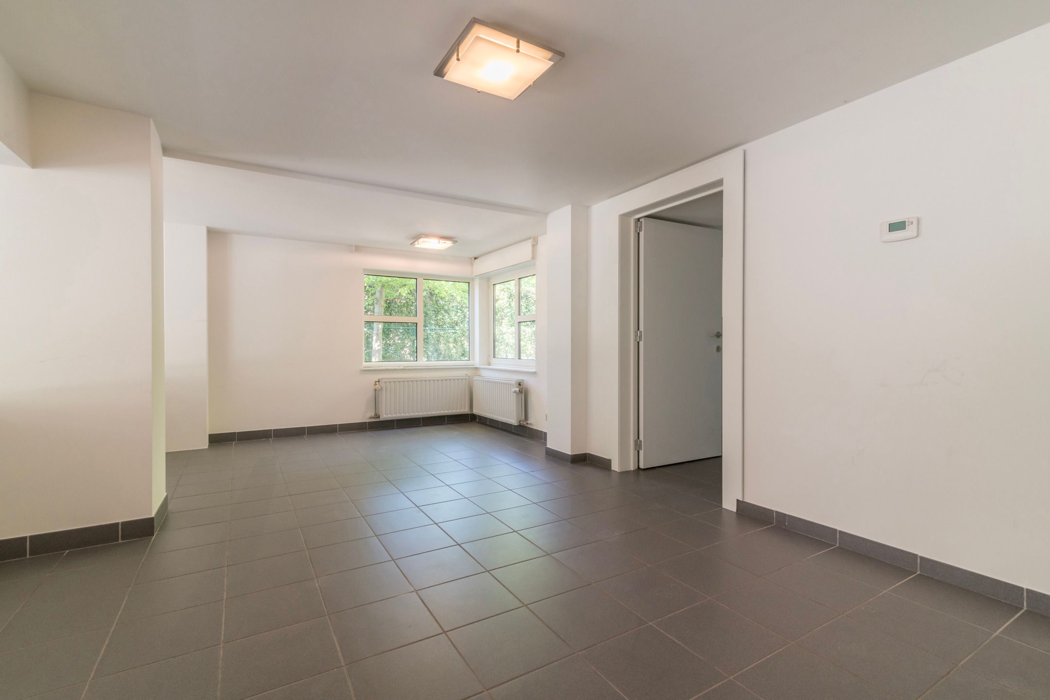 Kantoor- of praktijkruimte met woning op toplocatie foto 27