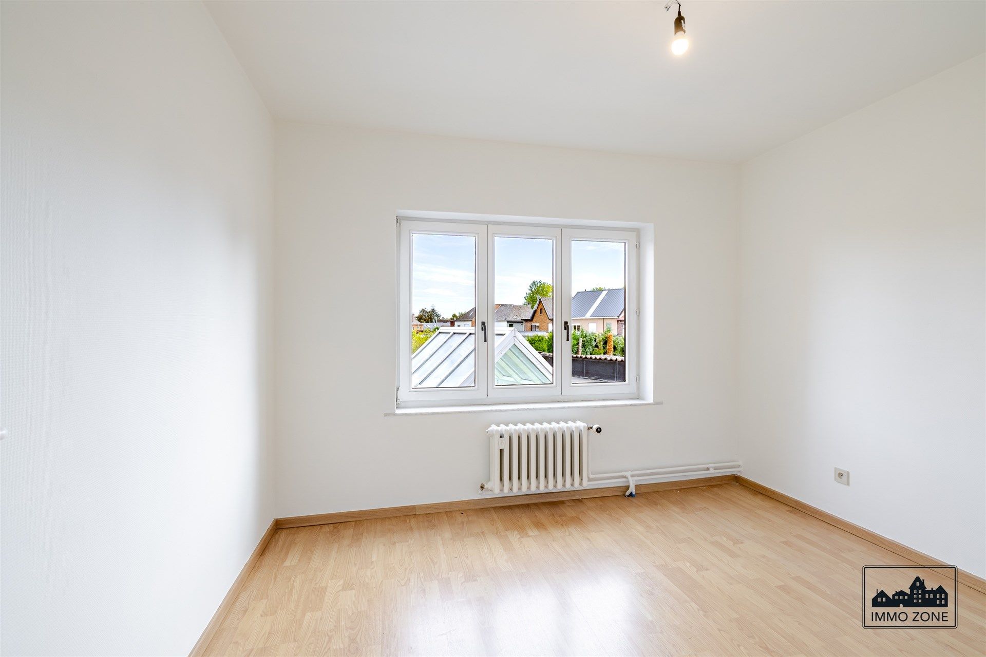 Lichtrijke halfopen woning te Nieuwerkerken! foto 10