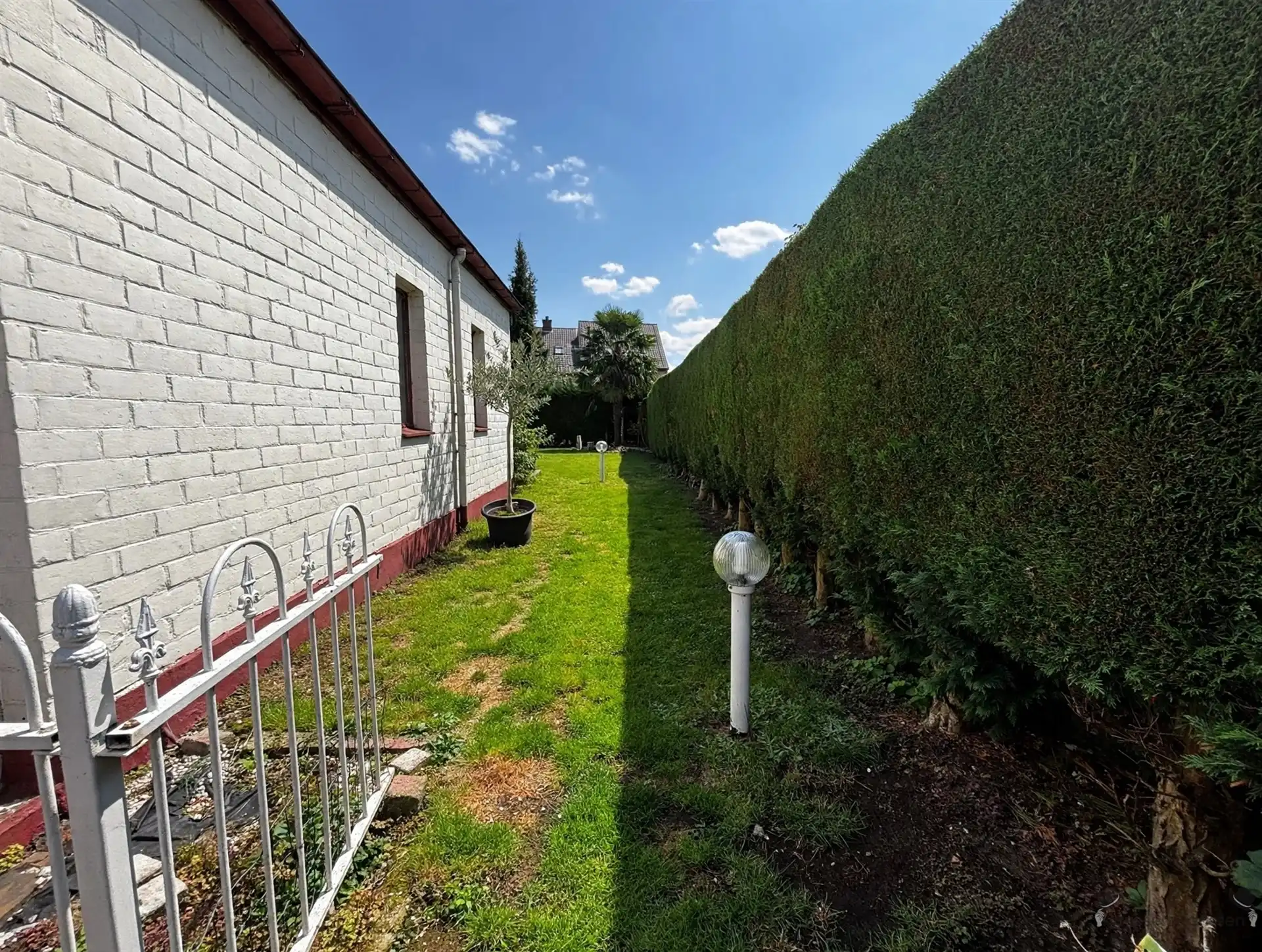 Handelspand met woonst, garage en tuin foto 19