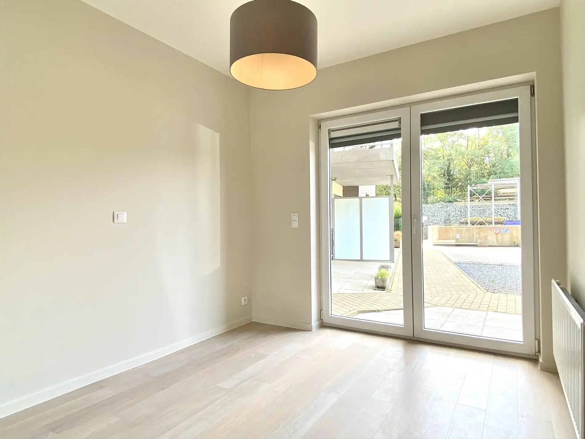 Ontdek dit prachtig gelijkvloers appartement met tuin en zicht op de Leie te Harelbeke! foto 8