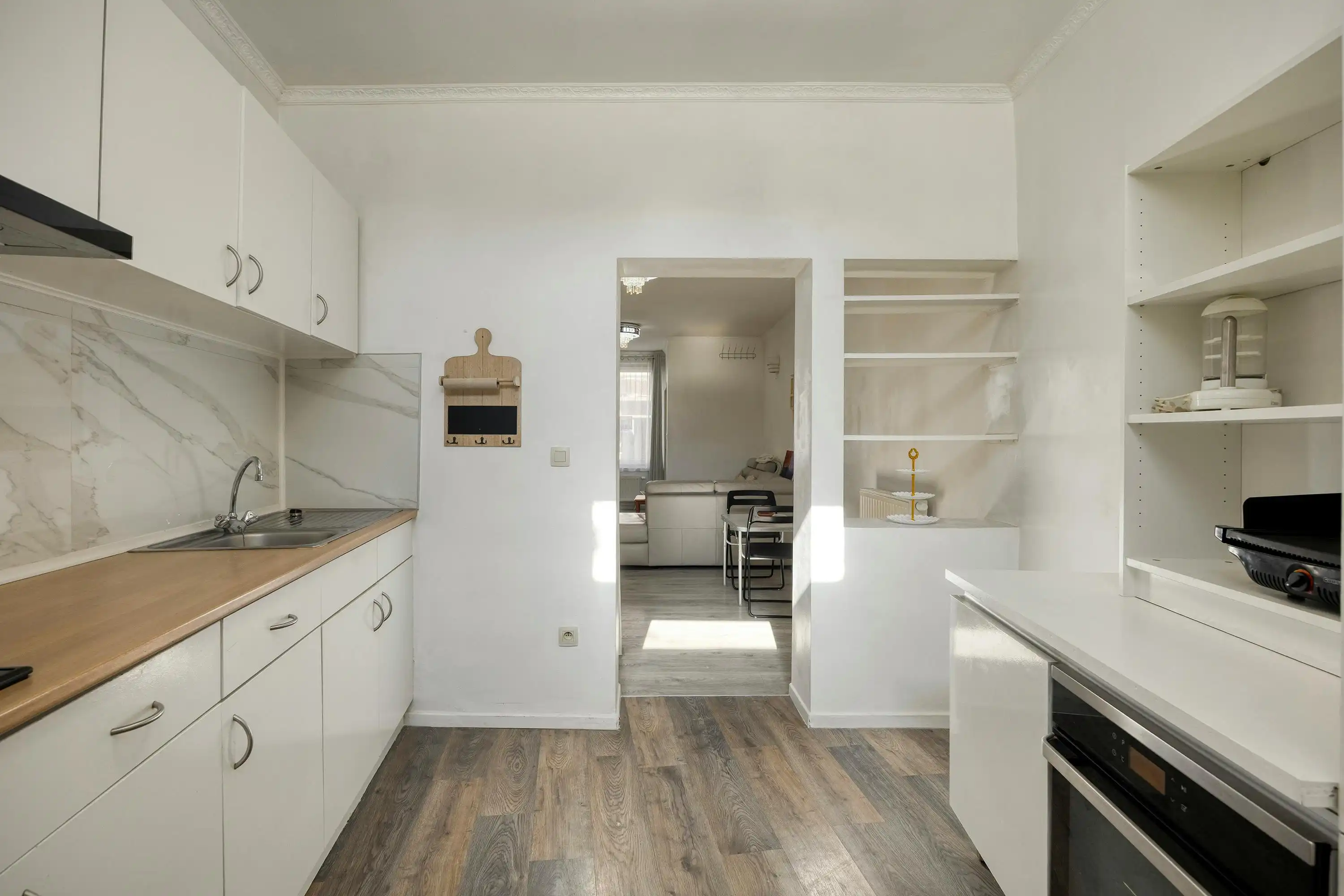 Charmante tweegevelwoning te koop in hartje Strombeek-Bever foto 5