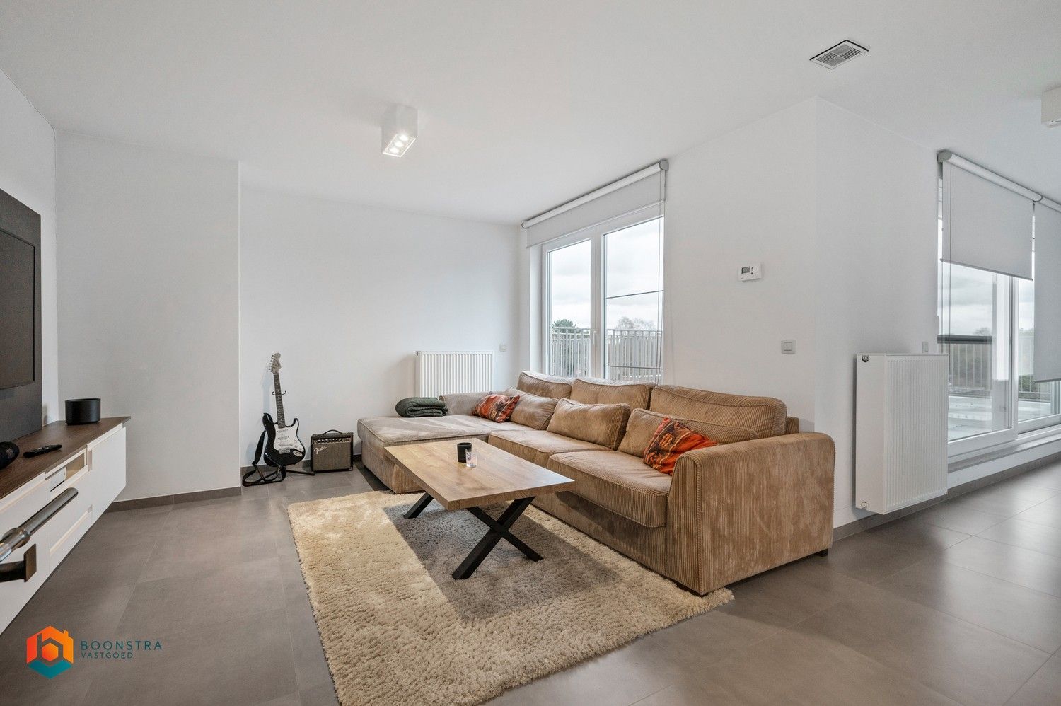 Lichtrijk penthouse met één slpkr en twee terrassen foto 2