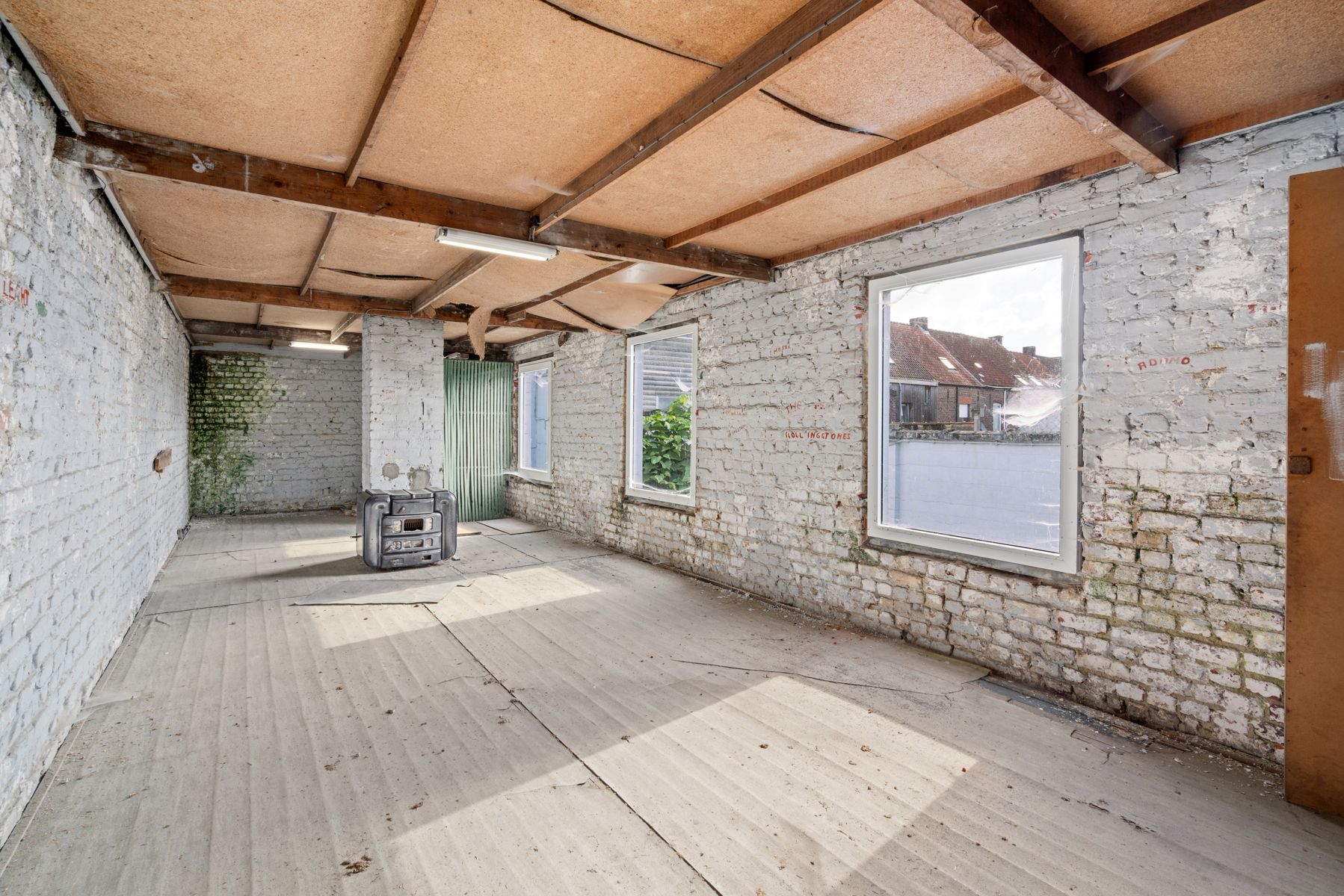Karaktervolle ruime woning  met bijgebouw/atelier en stadstuin in het centrum foto 21