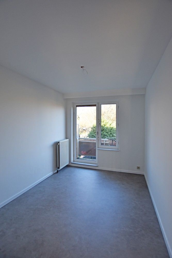 Verzorgd 2-slpk appartement met grote tuin te Borsbeek. foto 8