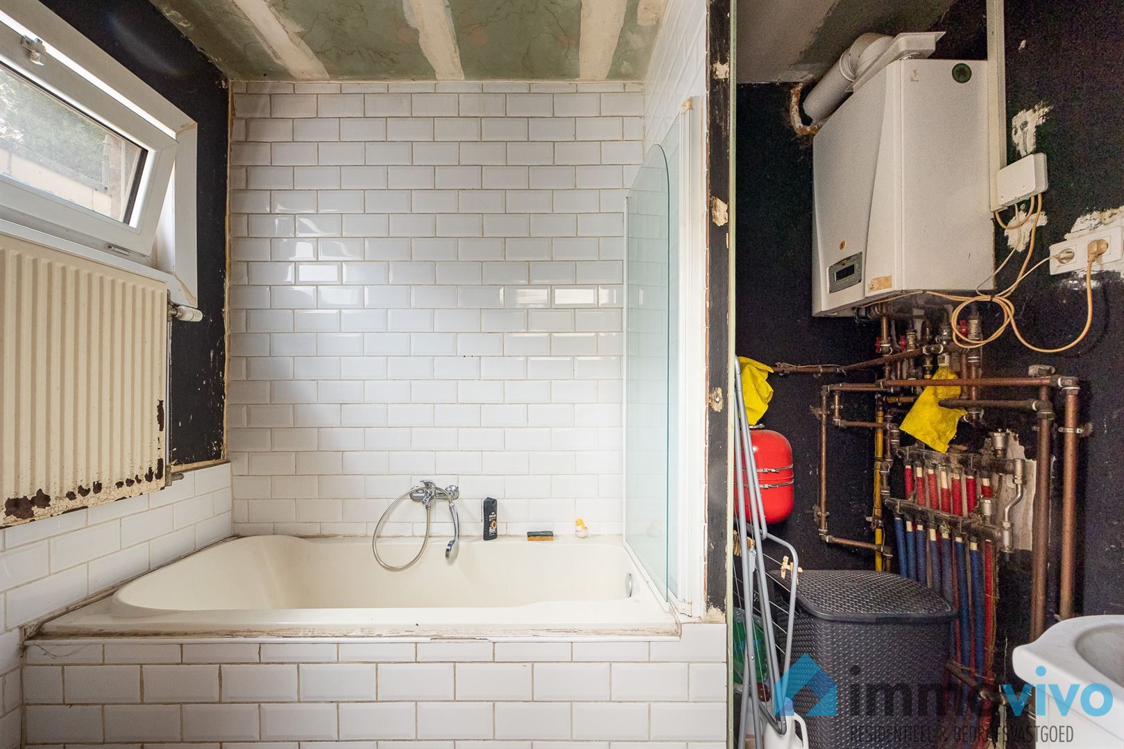 Te renoveren gezinswoning met 2/3 slaapkamers en zuidgerichte tuin. foto 7