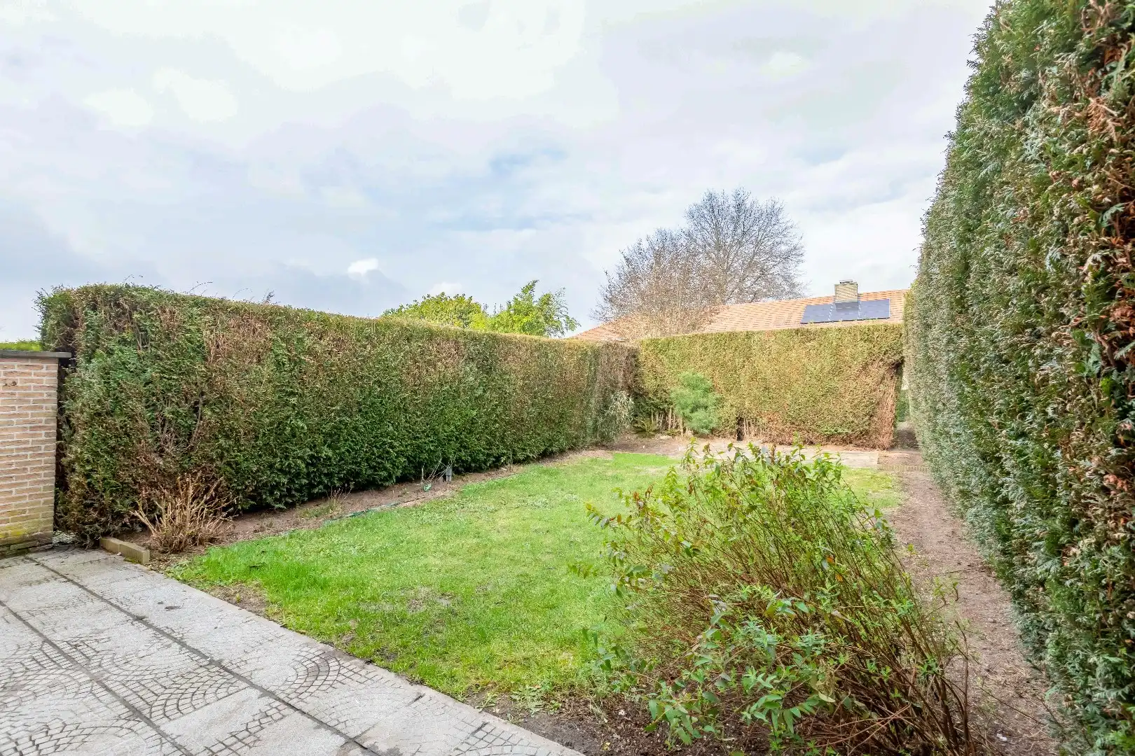Gunstig gelegen instapklare woning in rij met garage en toffe tuin foto 18