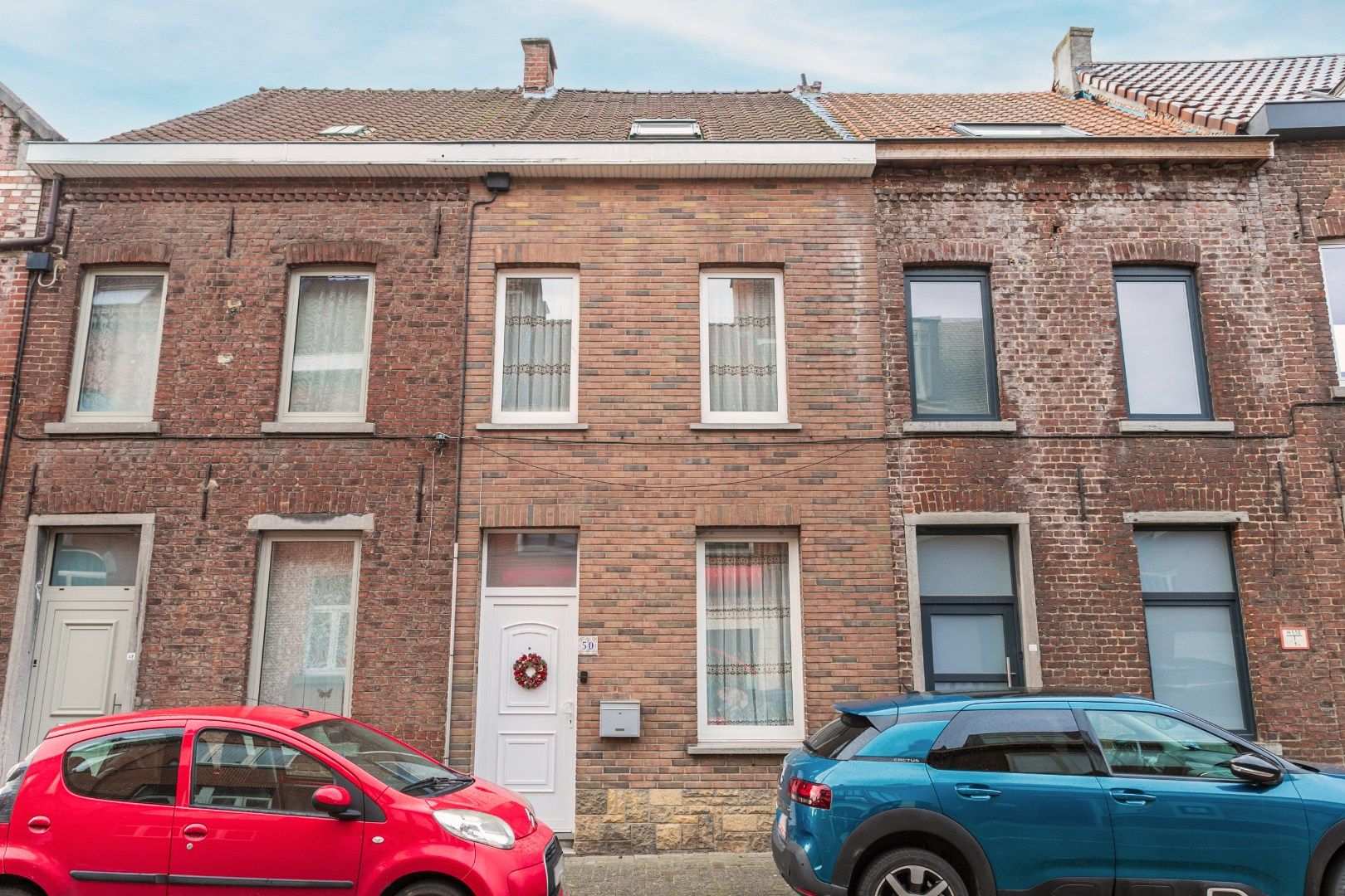 Instapklare woning met 3 slaapkamers, veranda en garagebox in Lembeek foto {{pictureIndex}}