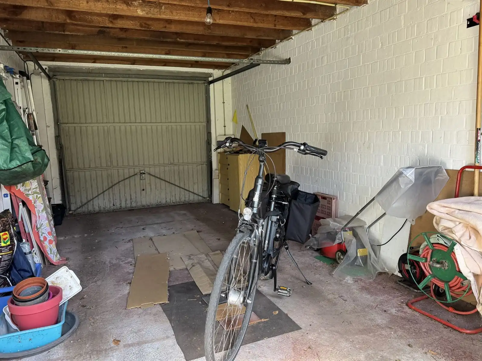 Gesloten bebouwing met garage foto 15
