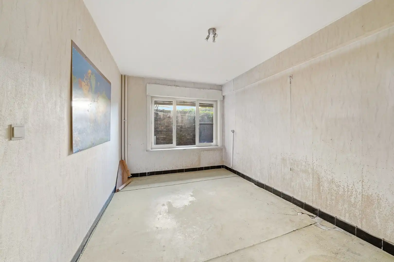 Te renoveren gelijkvloers appartement met 2 slaapkamers in Oostende foto 12