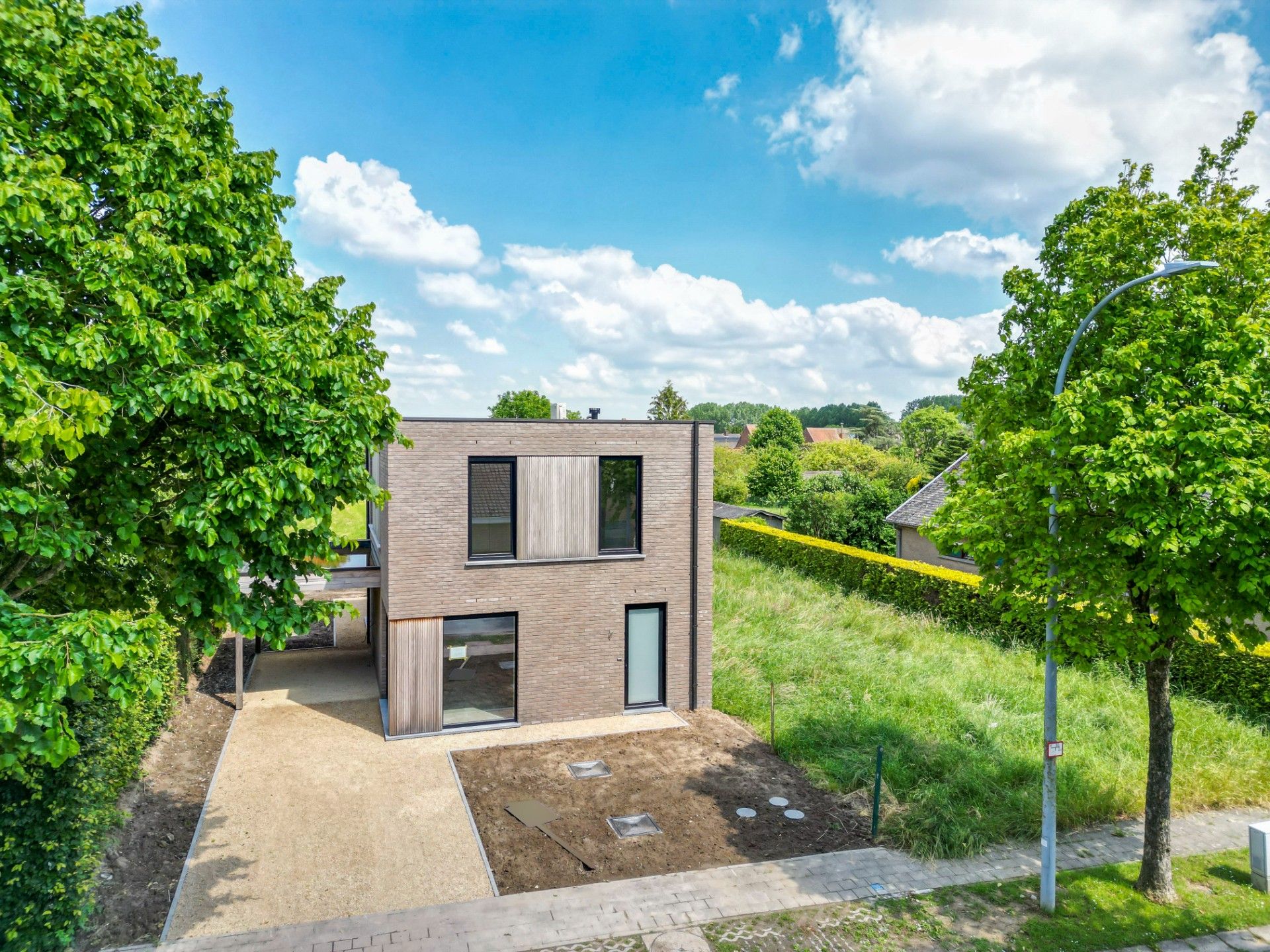 Knappe nieuwbouwwoning met carport! foto 5