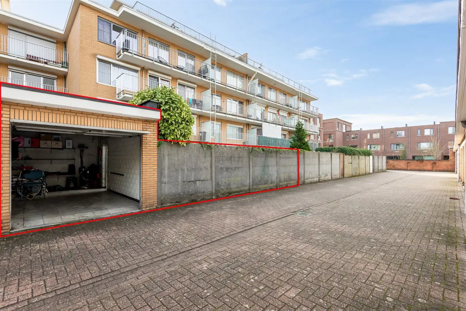 Ruim gelijkvloers appartement met tuin en garagebox foto 15