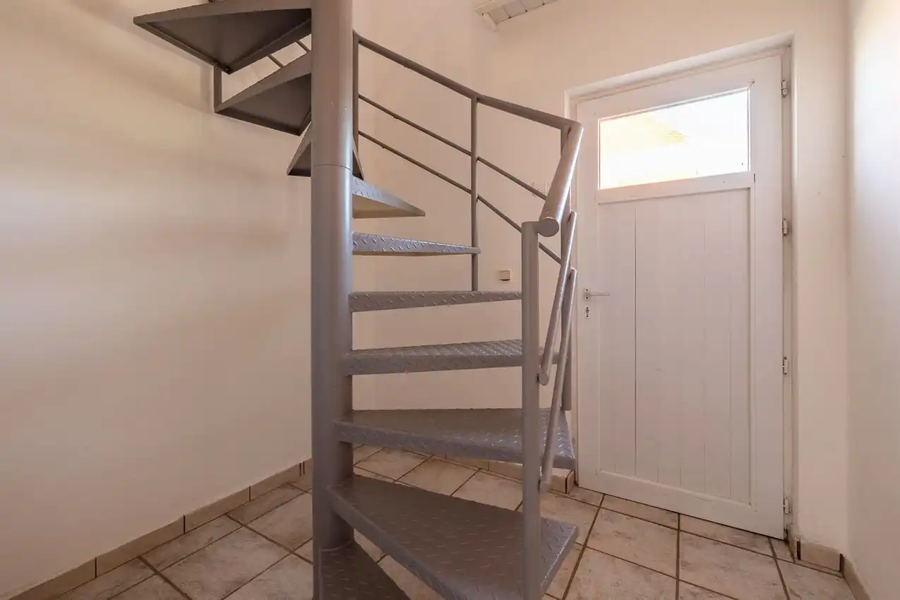 Verzorgde woning met 2 slpk., tuin en garage foto 12