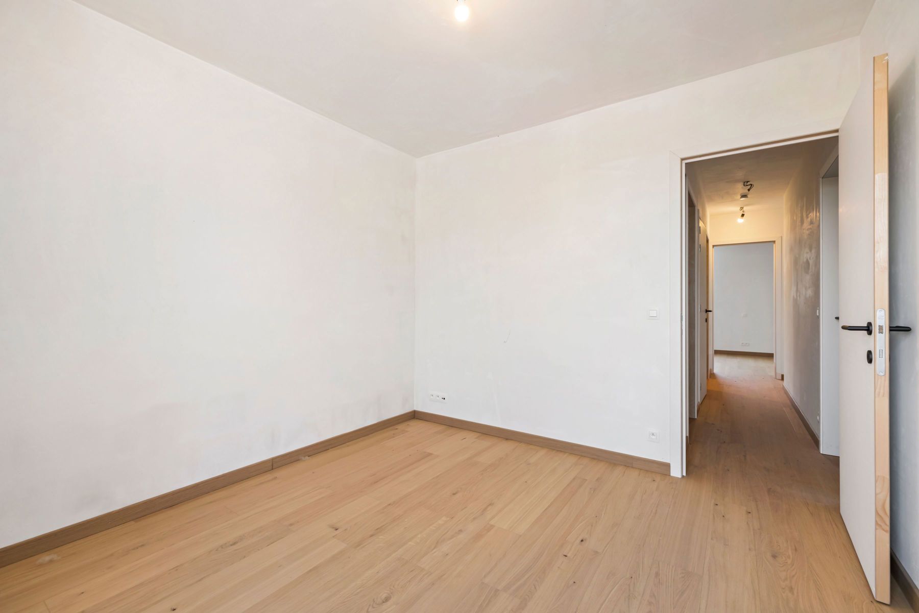 Nieuwbouwappartement met zéér ruim terras en groen zicht foto 18