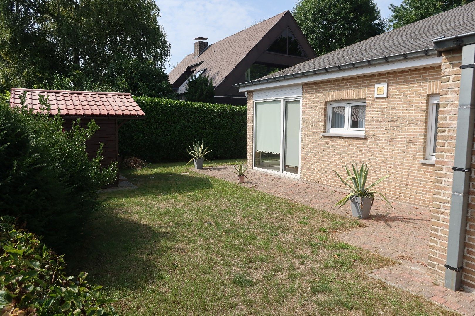 Bungalow met 2 slk, garage en tuintje foto 17