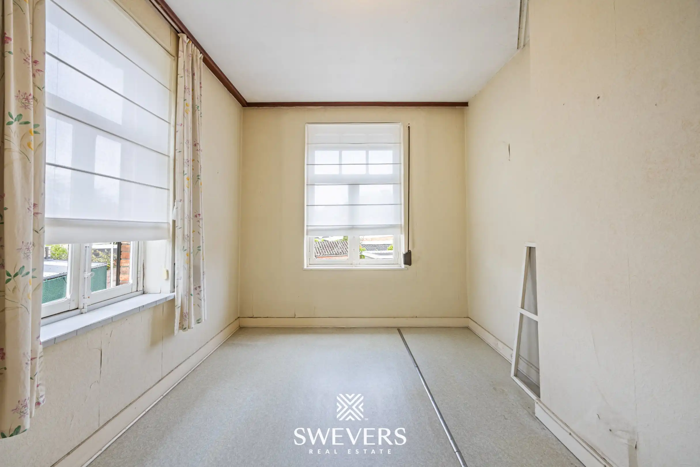 Mooi gelegen te renoveren woning, op een zonnig hoekperceel van 2a57ca foto 17