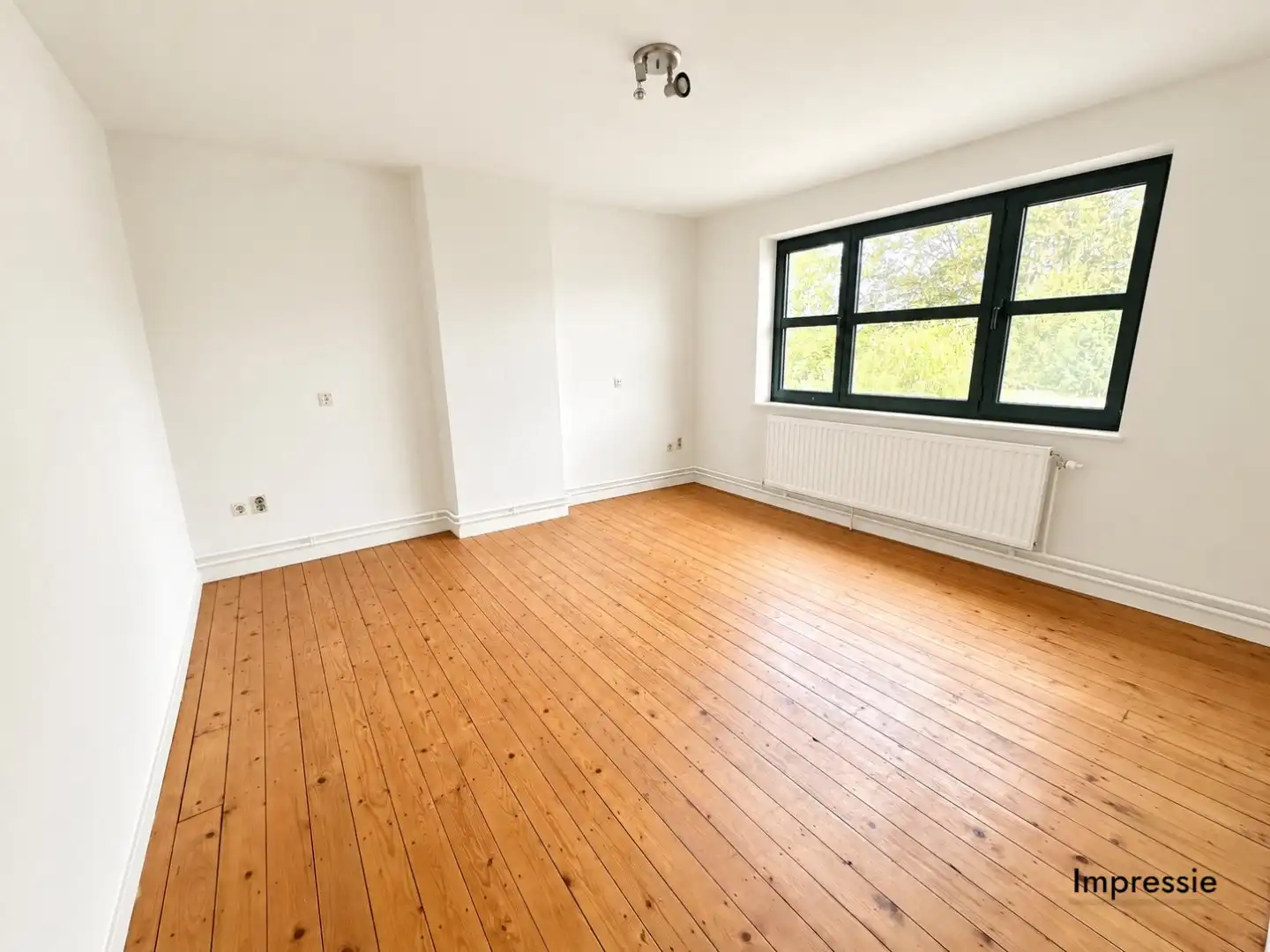 Ruime woning in het centrum van Zonhoven. foto 12