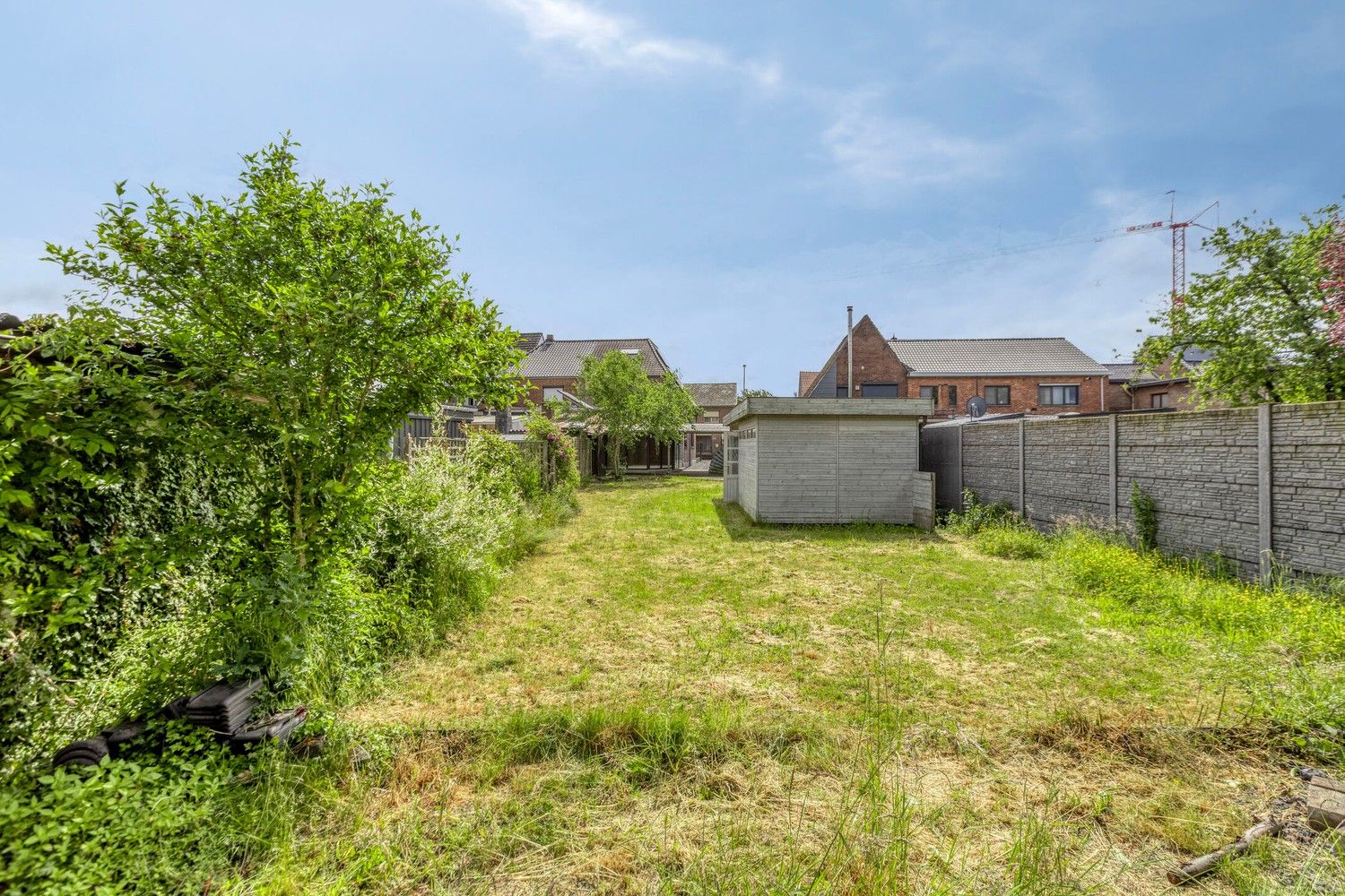 Halfopen gezinswoning met drie slaapkamers (mogelijkheid tot 4), grote tuin en zonnepanelen! foto 35