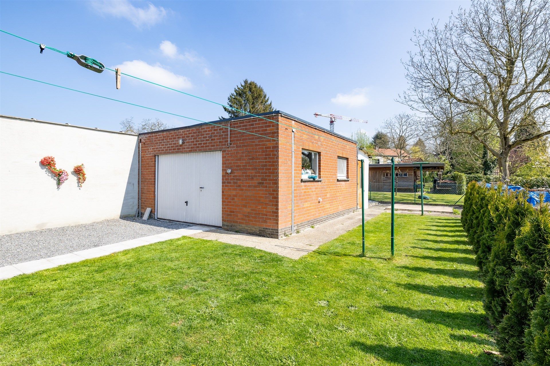 Topinvestering van 2 appartementen met tuin, garage en zolder foto 11