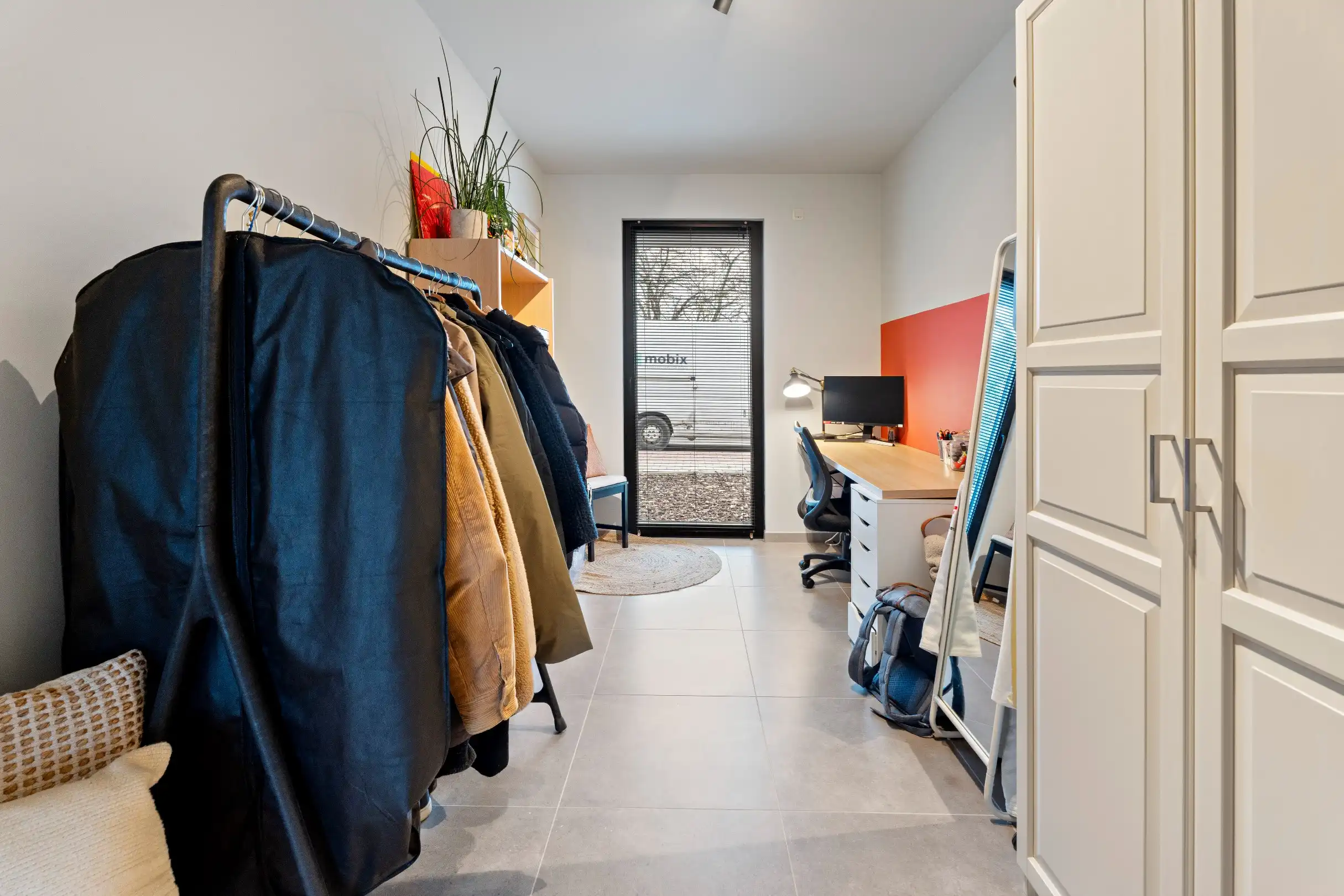 Gelijkvloers appartement met terras en tuin foto 14