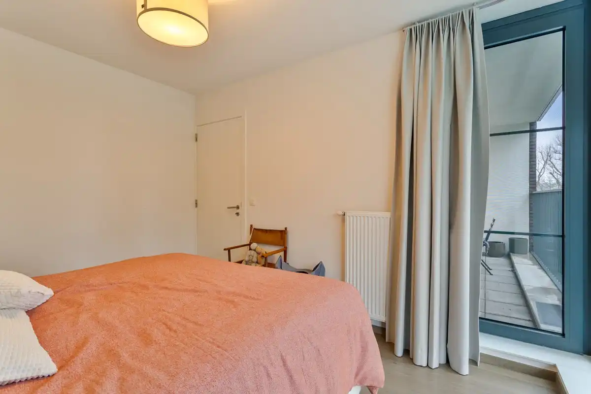 VERKOCHT - Energiezuinig 3 slaapkamer appartement met zonnig terras en tuin. foto 11