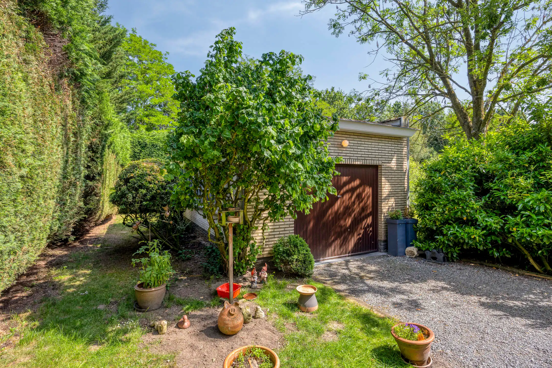 Halfopen woning met ruime garage en uitbreidingspotentieel foto 34