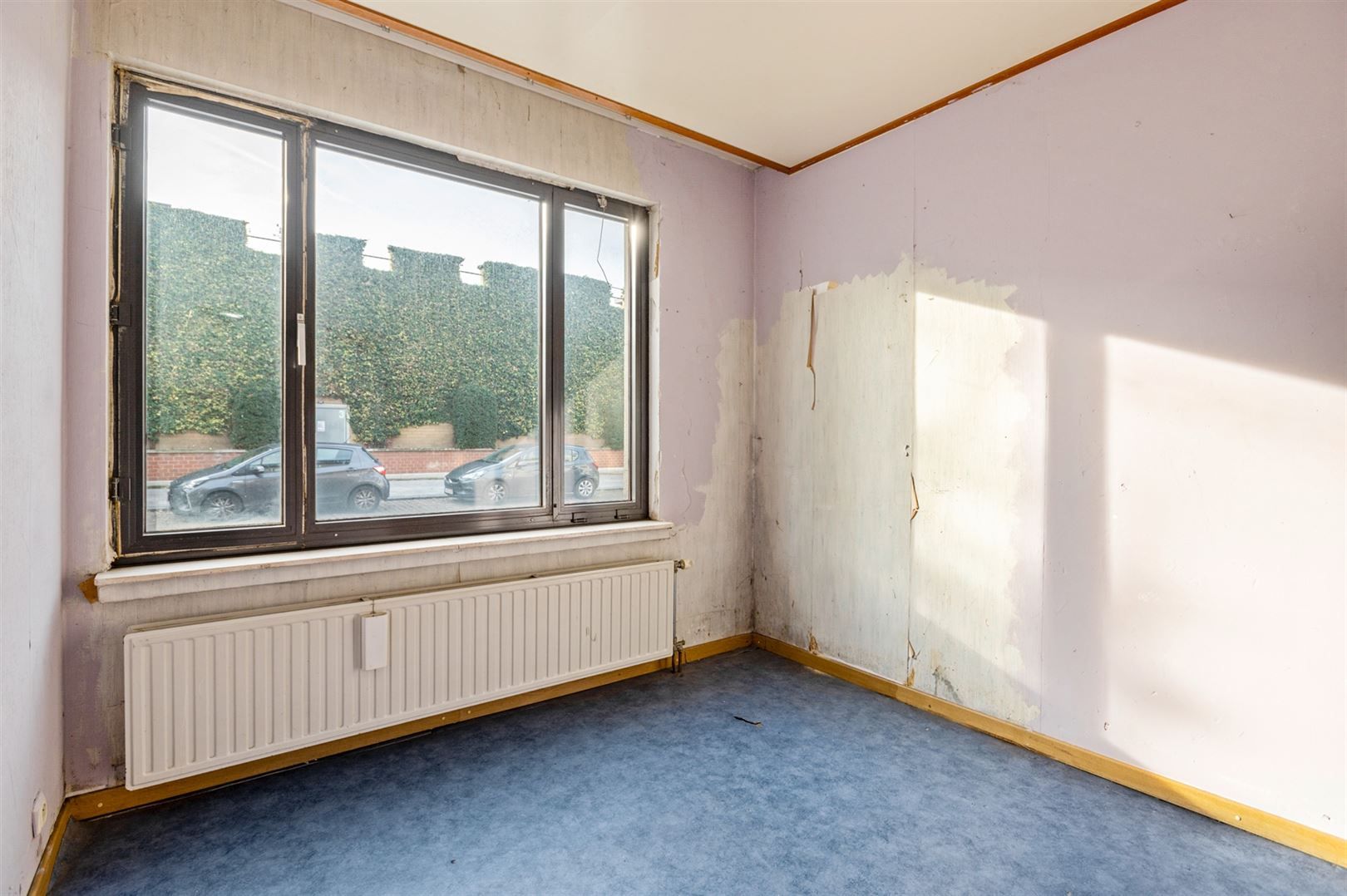 Te renoveren gelijkvloers appartement met garagebox foto 12