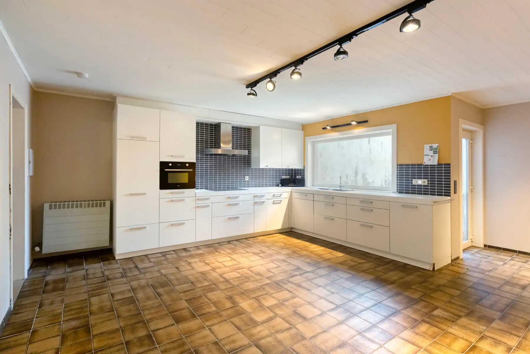 TE KOOP - instapklare woning met 3 slaapkamers en garage foto 9