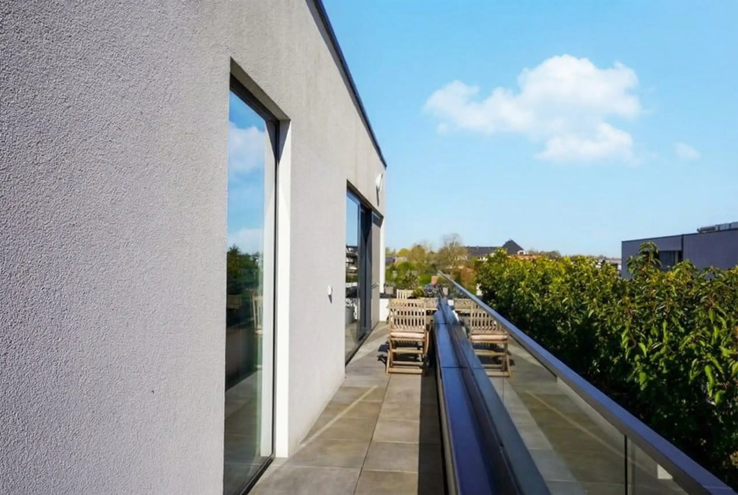 Onweerstaanbare serviceflat met grote staanplaats en terras! foto 18