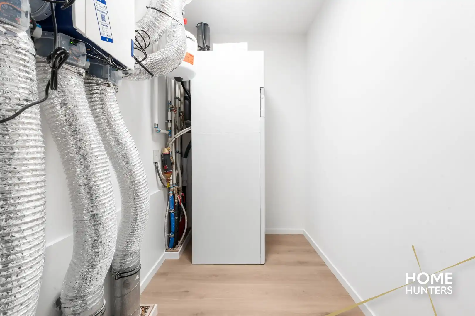 Luxueus afgewerkte halfopen nieuwbouwwoning met vergezichten foto 21