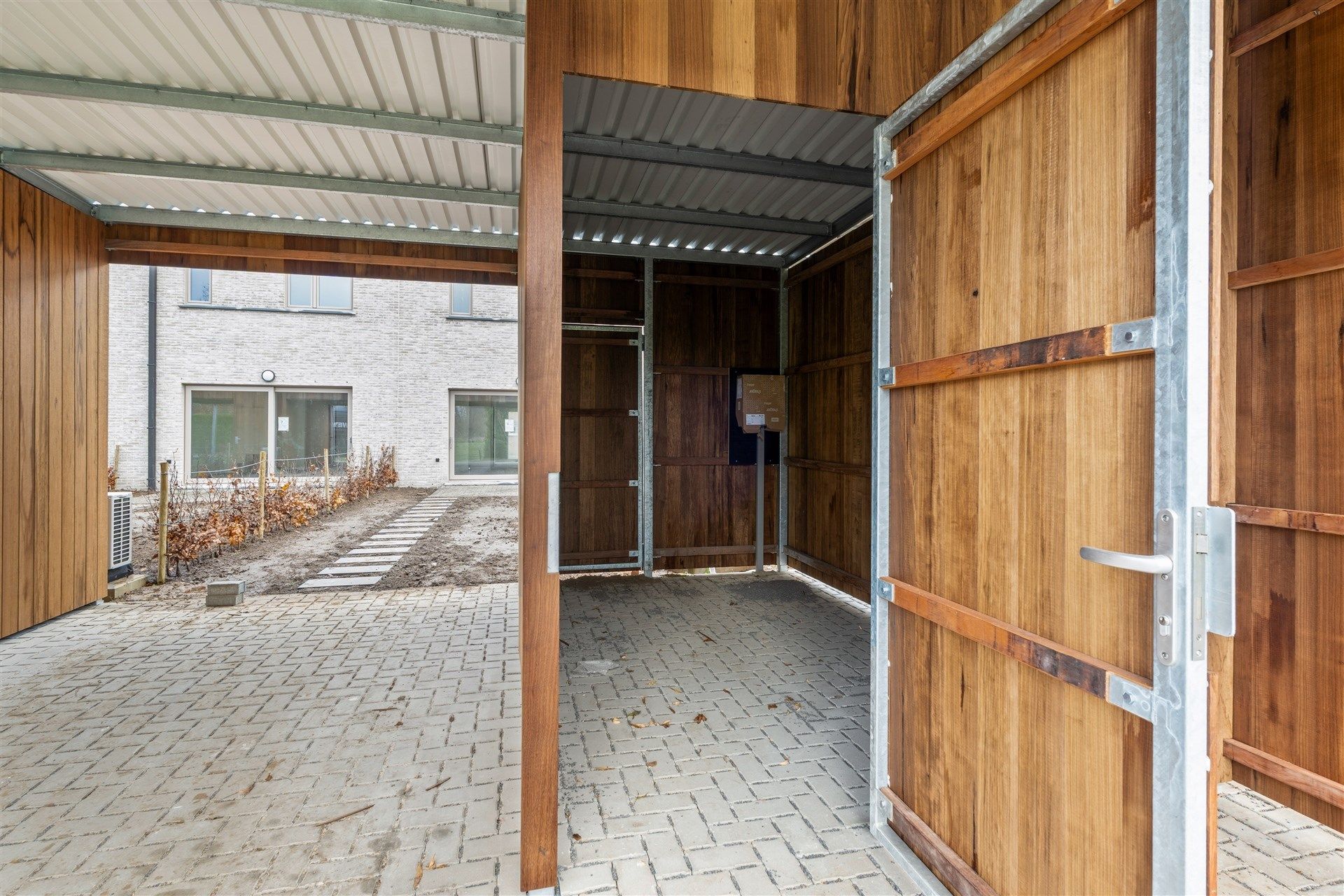 Zeer kwalitatieve woning met aanpalende carport foto 20