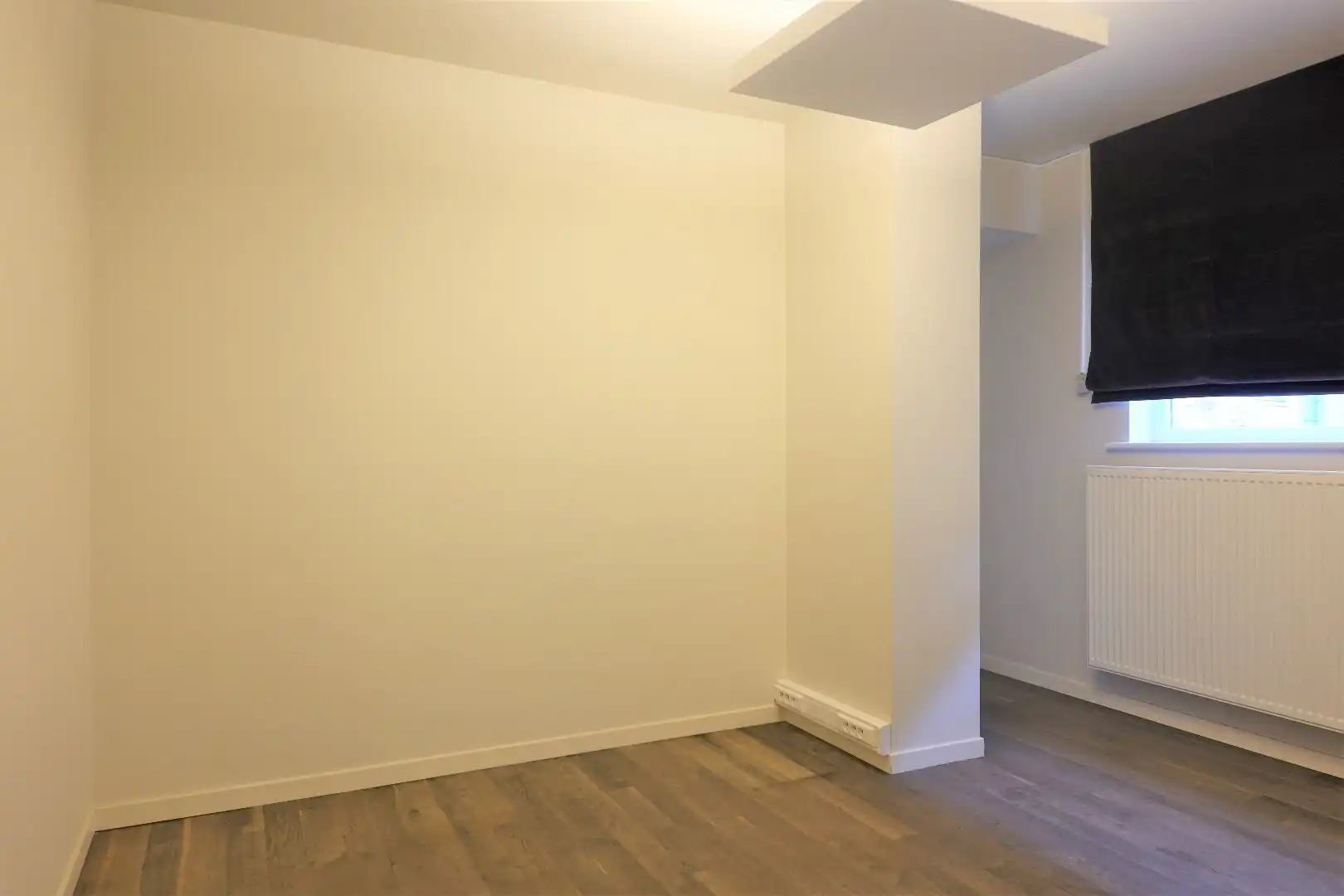 Ruim gelijkvloers appartement met koertje  foto 13