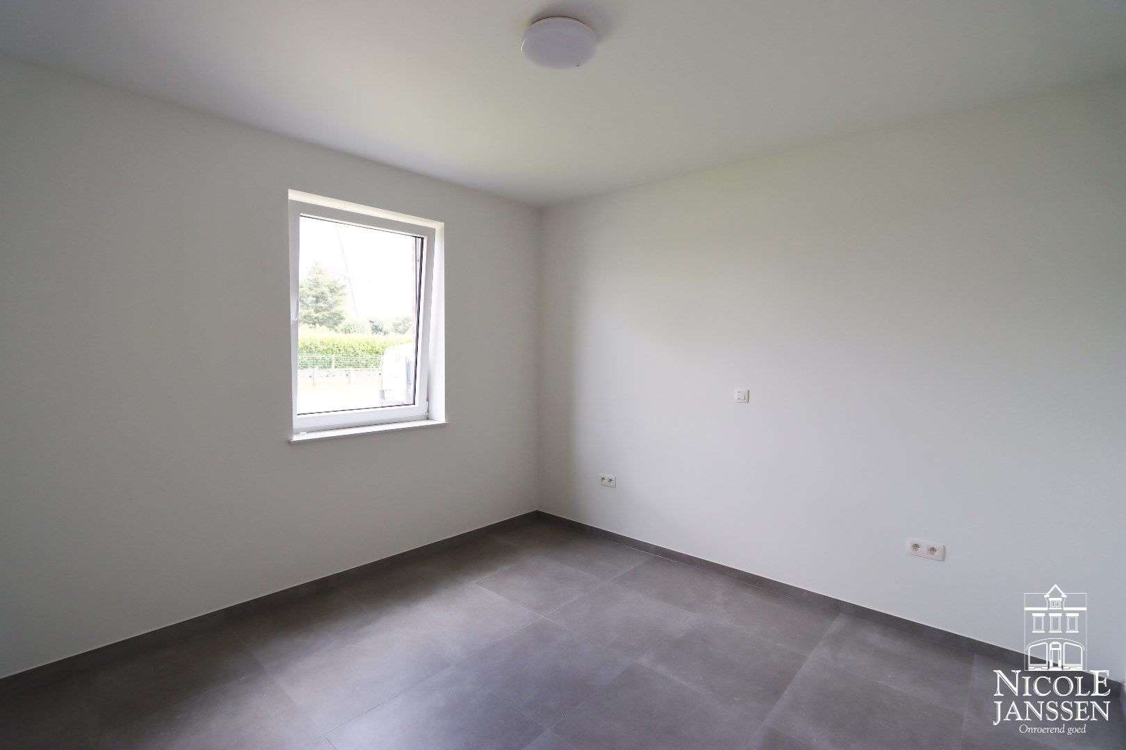 Nieuwbouwappartement met mooi tuintje, autostandplaats en buitenberging. foto 9