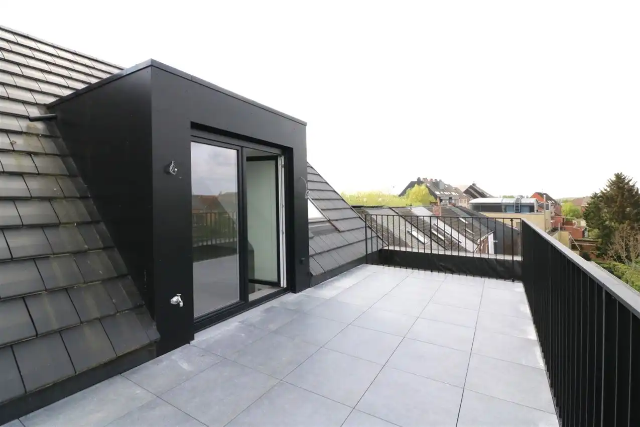 Uniek penthouse in centrum Aarschot met 1 slpk. parking en terras foto 14
