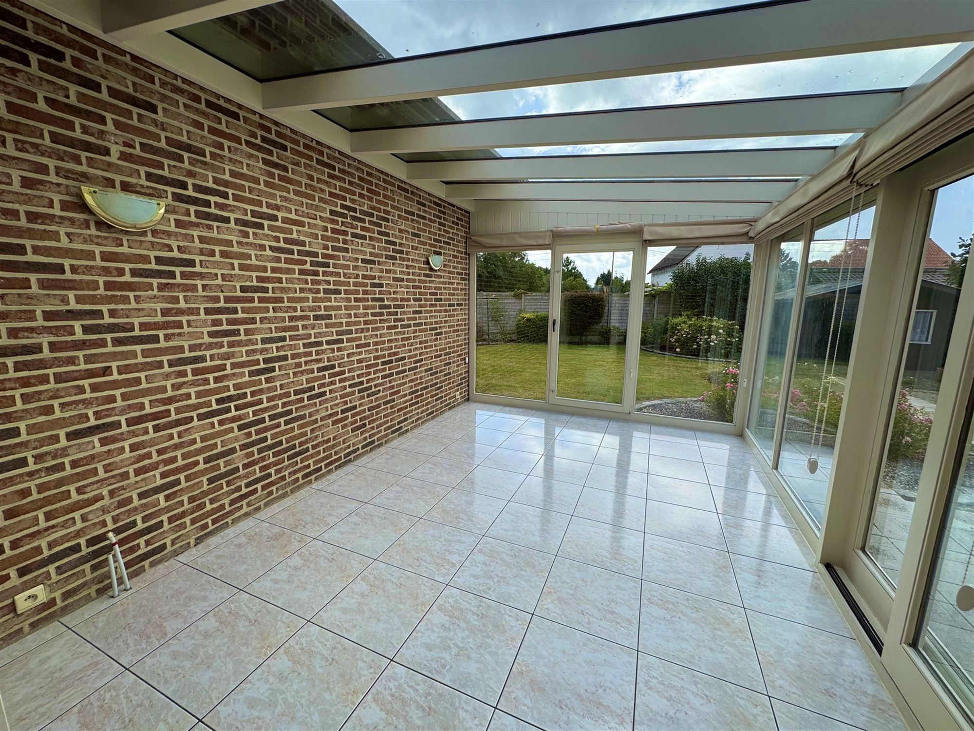 GOED ONDERHOUDEN GELIJKVLOERSE WONING MET 2 SLAAPKAMERS EN LEUKE VERANDA TE HAM foto 11