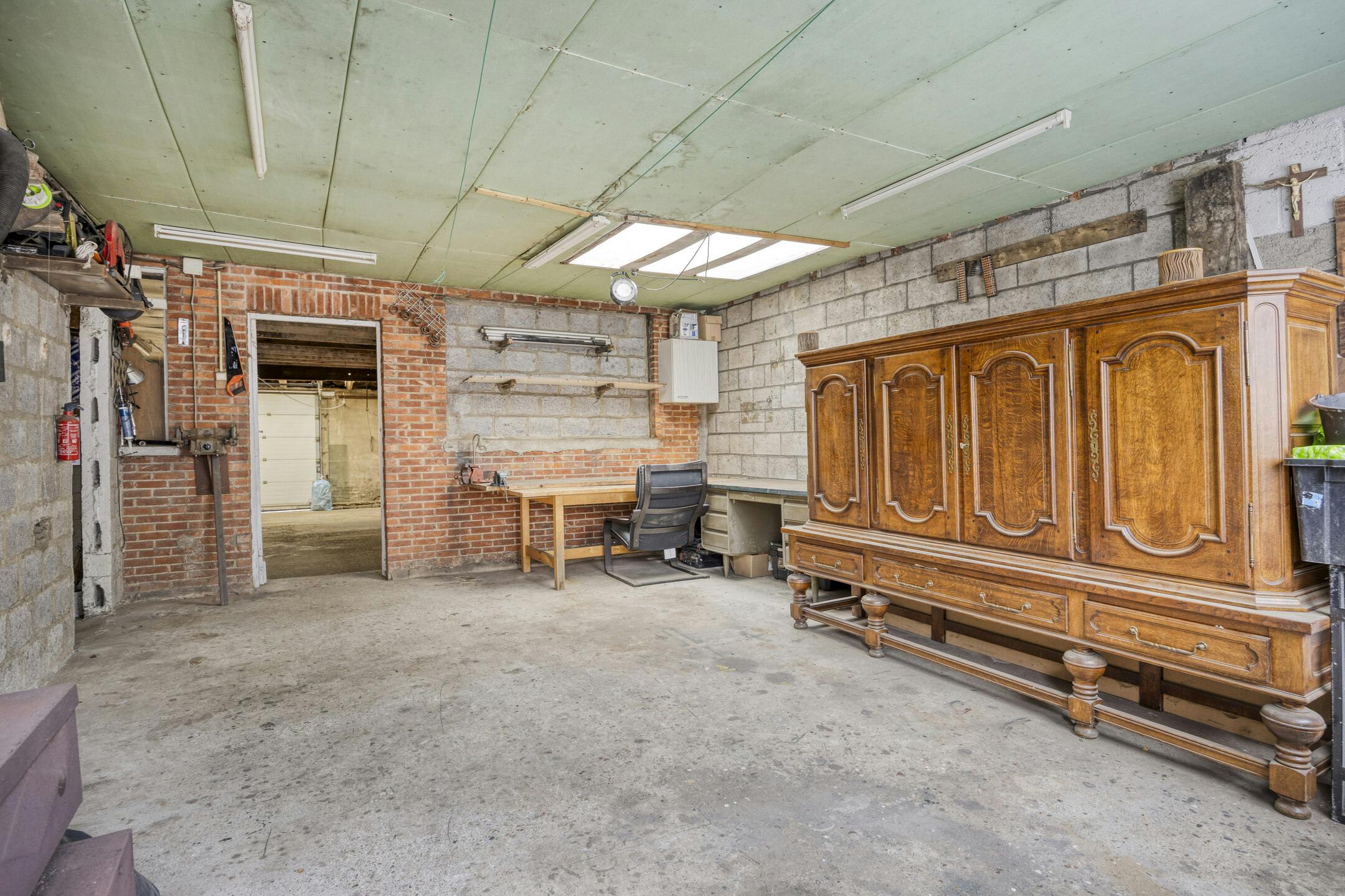 Uniek handelshuis met ruime garage in het hartje Borgloon foto 21