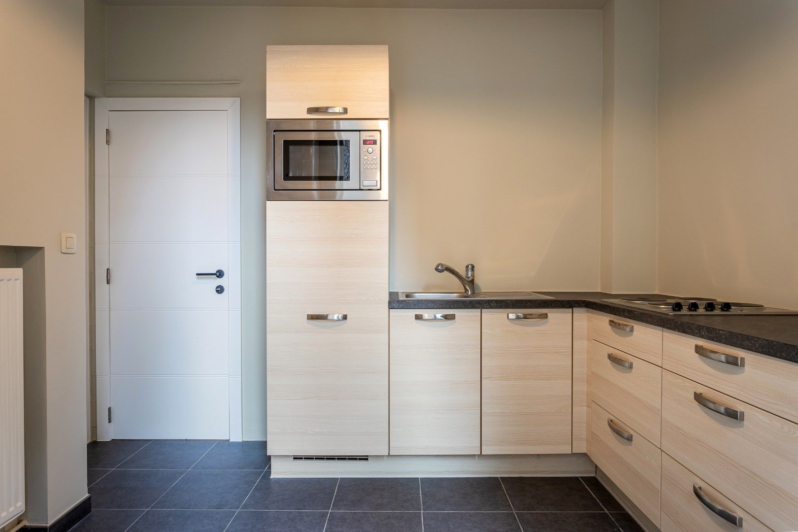 Gerenoveerd (2025) gelijkvloers appartement met 1 slaapkamer en ruime kelderberging foto 4