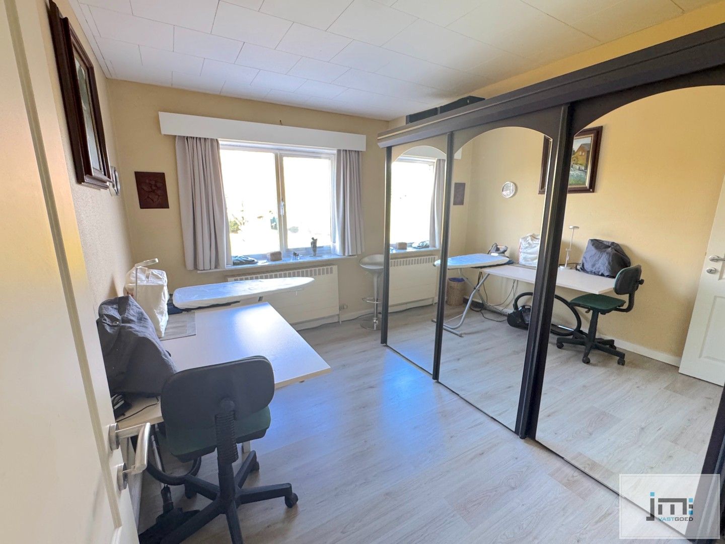 Gelijkvloerse woning foto 11